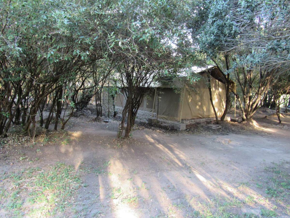 Enchoro Wildlife Camp Hotel Ololaimutiek ภายนอก รูปภาพ