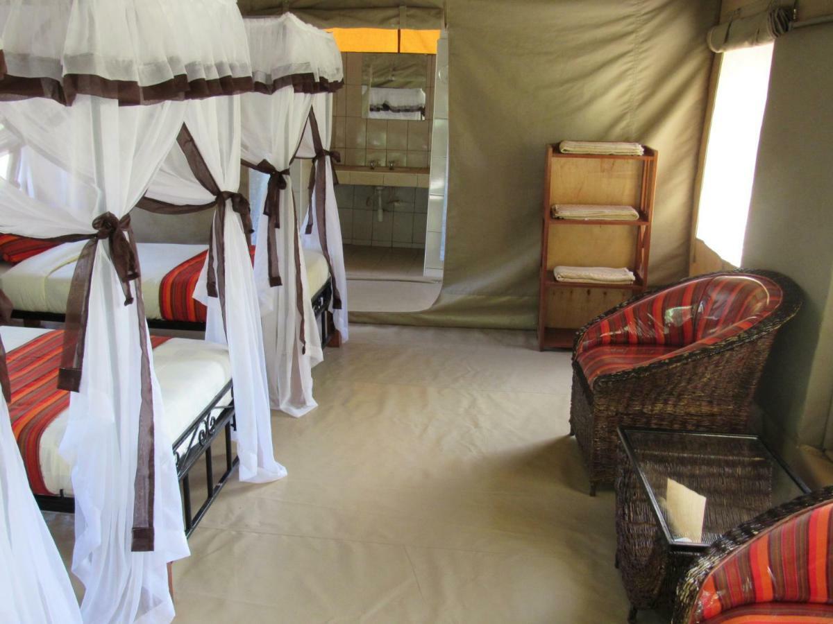 Enchoro Wildlife Camp Hotel Ololaimutiek ภายนอก รูปภาพ