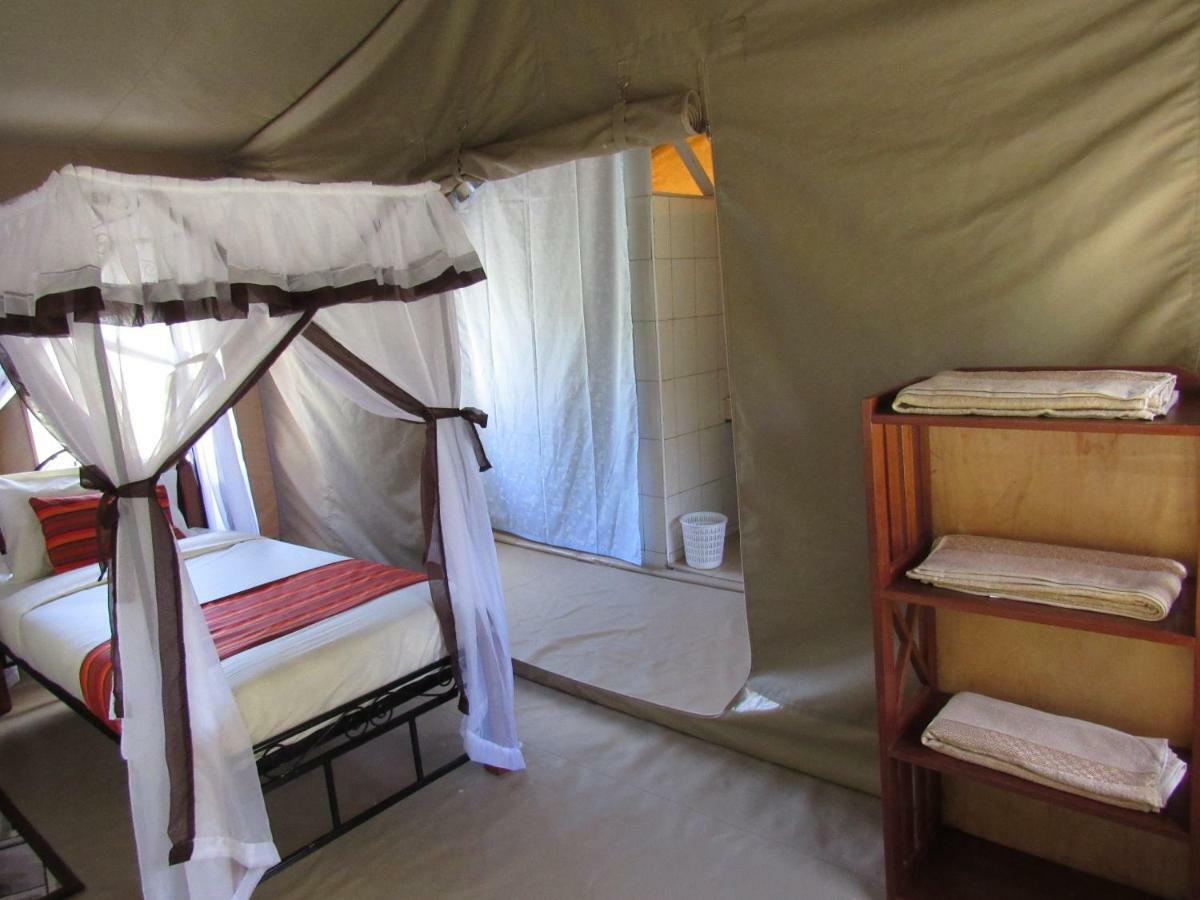 Enchoro Wildlife Camp Hotel Ololaimutiek ภายนอก รูปภาพ