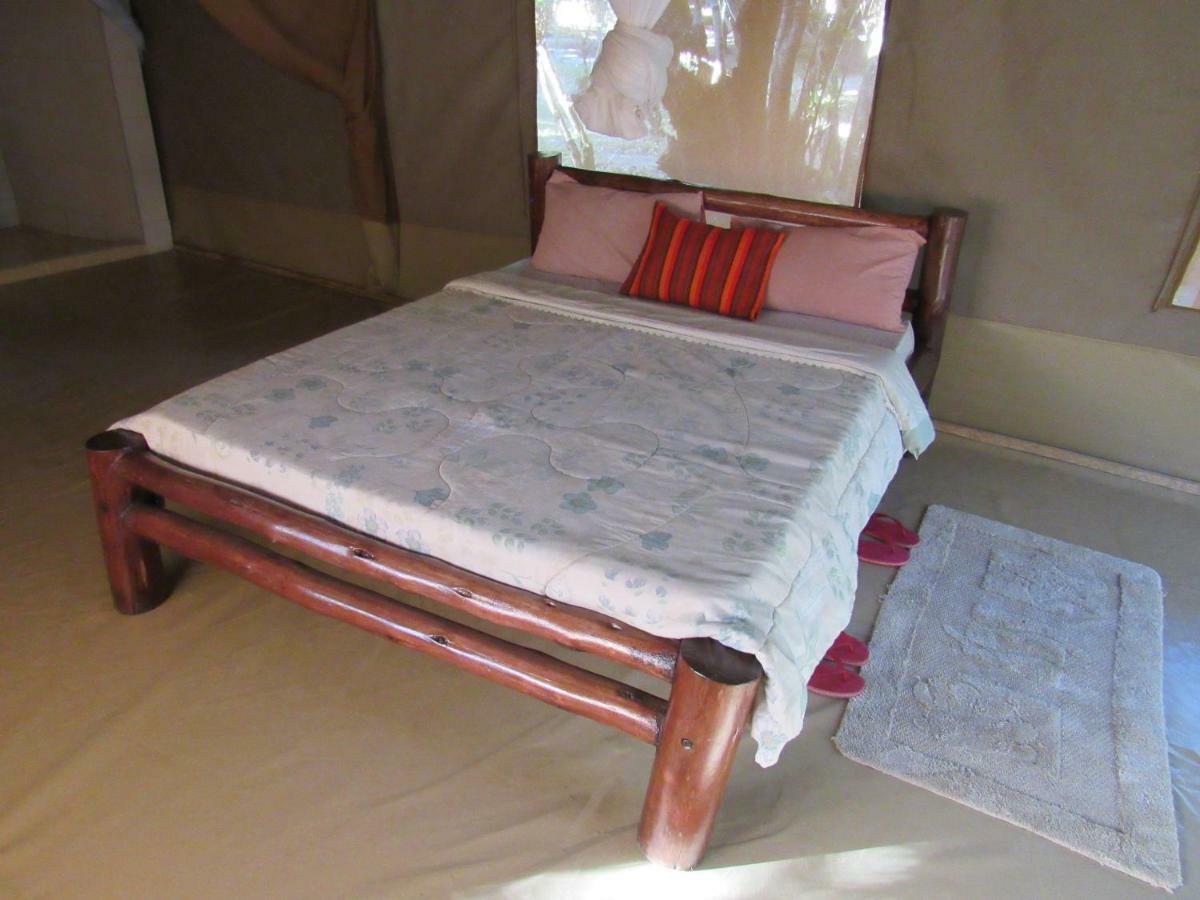 Enchoro Wildlife Camp Hotel Ololaimutiek ภายนอก รูปภาพ